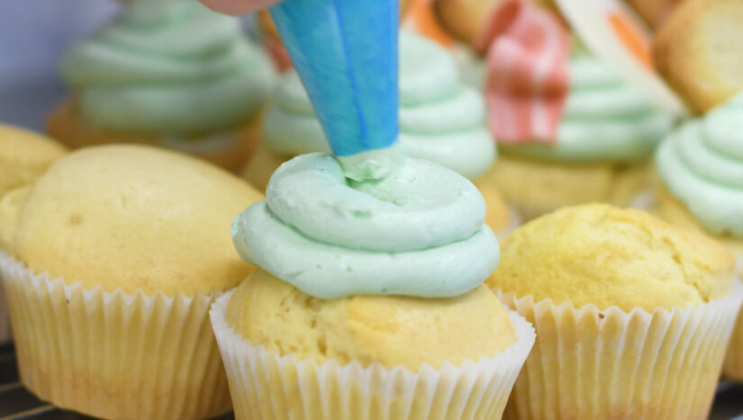 Hamilton student making cupcakes.