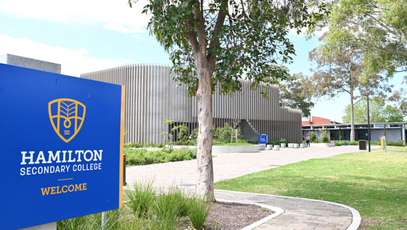 The school grounds and welcome sign.